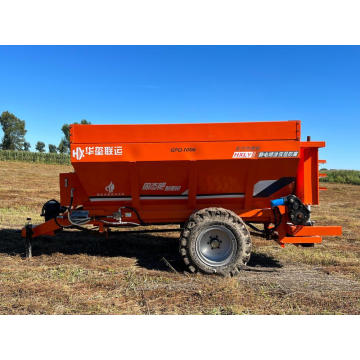 Agricultural tractor manure spreader